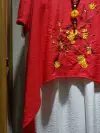 Business women's clothing with a large round neck embroidered with golden flowers in bright red details Picture